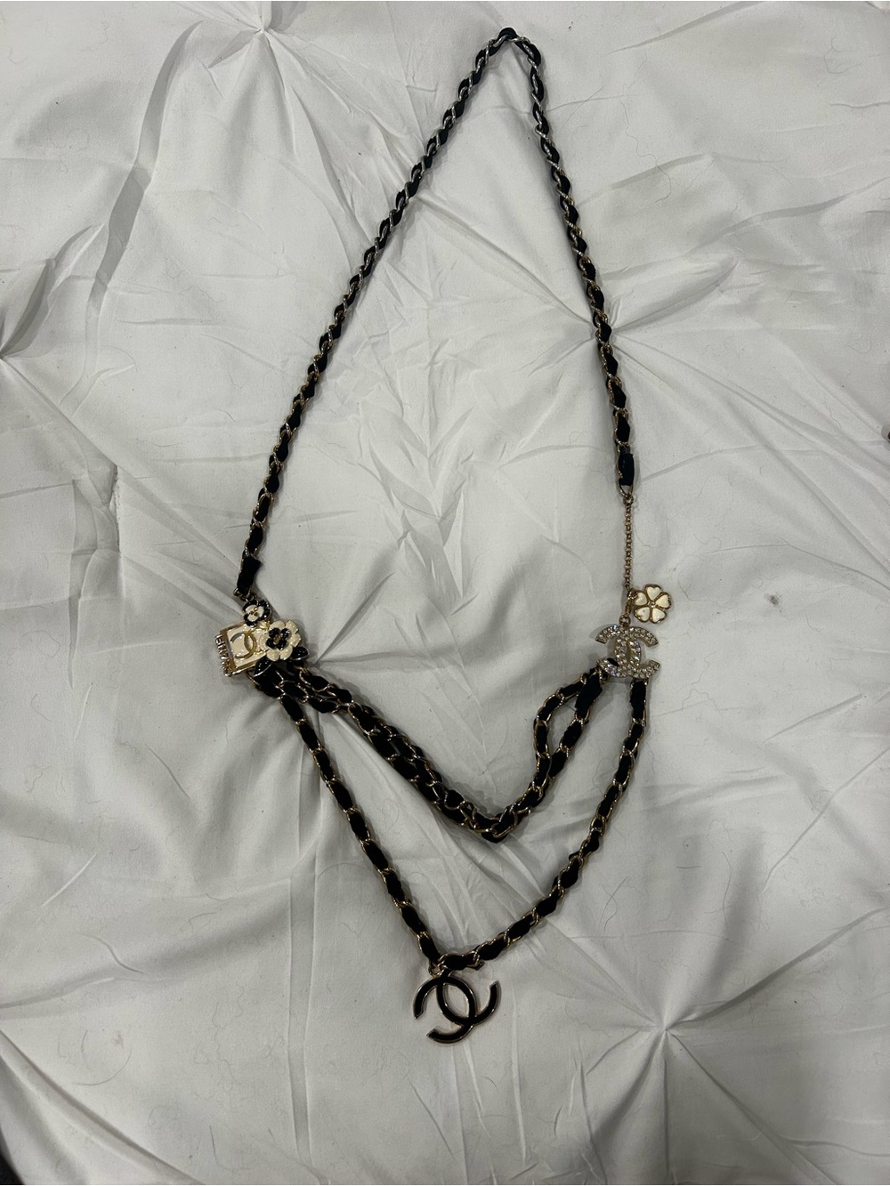 Black and Gold Triple-Layer Necklace with Flower and Logo Charms